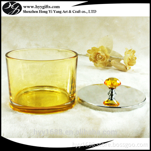 yellow colored candle tumbler jars with decorative metal lid withe holes